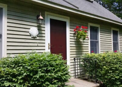 This is an exterior painting project in County Rd Limington Me