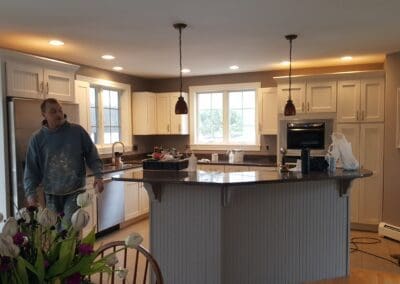This is a cabinet painting project in Biddeford ME