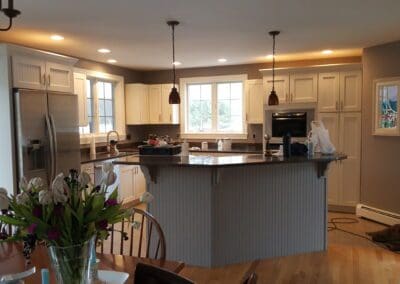 This is a cabinet painting project in Biddeford ME