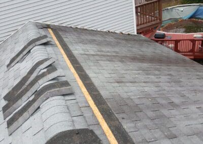 This is a roofing project in 302 Windham Me